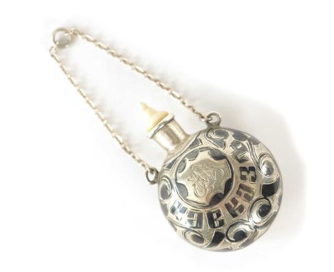 A 19TH CENTURY RUSSIAN NIELLO SILVER SCENT BOTTLE with foliage decoration - in fitted leather case5cm high There are 3 small 