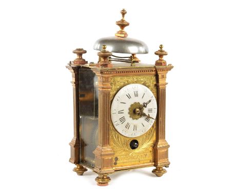 AN EARLY 19TH CENTURY FRENCH CAPUCINE STYLE CARRIAGE/MANTEL CLOCK the gilt brass foliate engraved case with square reeded cor
