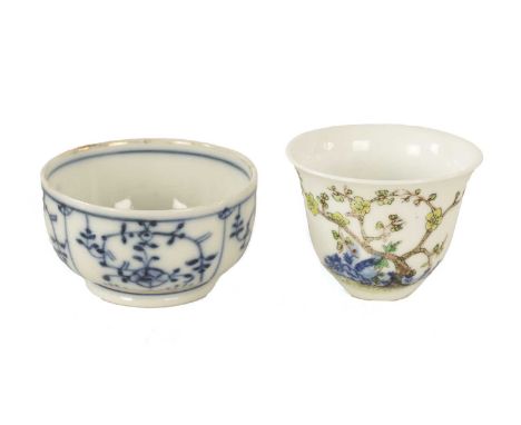 TWO CHINESE PORCELAIN BOWLS one with coloured enamel branchwork decoration, script to the reverse and six character signature