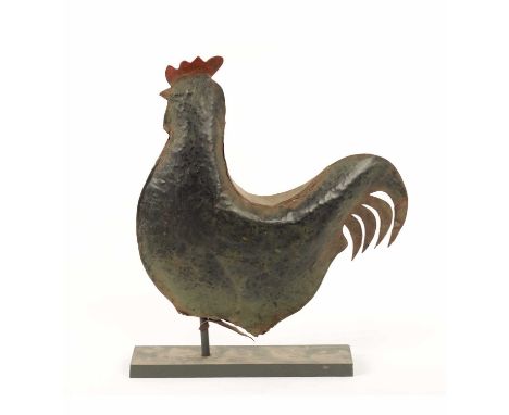 A 19TH CENTURY TIN WORK COCKEREL WEATHER VANE with tinted highlights40cm wide 39cm high