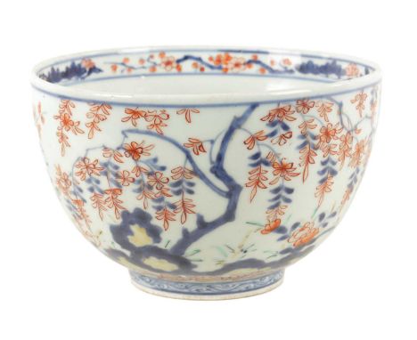 A 19TH CENTURY JAPANESE IMARI BOWL decorated with blossoming foliage and flower sprays.16.5cm dimaeter 10cm highThe bowl is i