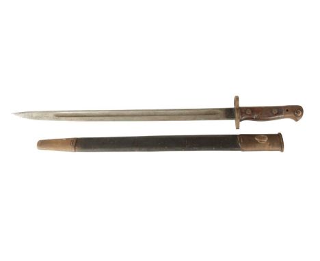 A 1907 PATTERN WW1 BAYONET with single-edged fullered steel blade and brass guard on a wooden handle in the original brass mo