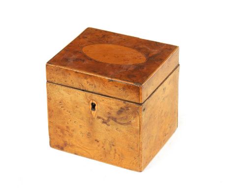 A GEORGE III BURR ELM TEA CADDY with oval birds eye maple panelled top and boxwood strung edges.12cm wide 10cm deep 11.5cm hi