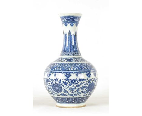 A 19TH CENTURY BLUE AND WHITE CHINESE PORCELAIN VASE decorated with floral sprays and geometric designs - signed six characte