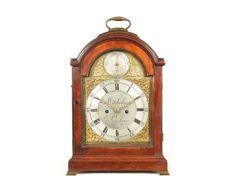 MITCHELSON, LONDON. A GEORGE III PAD TOP MAHOGANY BRACKET CLOCK the case with brass moulded centre pad and folding handle abo