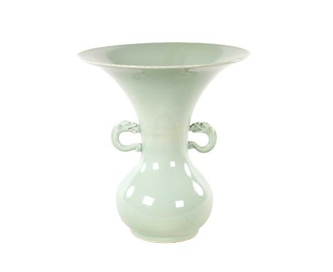 A 19TH CENTURY JAPANESE CELADON GLAZED FLARED NECK BULBOUS VASE with ribbon detail to the large flared rim above a bulbous bo