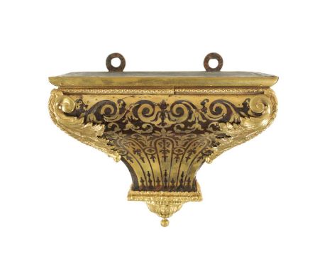 A 19TH CENTURY FRENCH CONTRA BOULLE TORTOISESHELL BRACKET CLOCK WALL MOUNT of shaped form with ormolu mounts.24.5cm wide 14cm