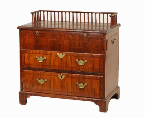 AN UNUSUAL GEORGE I AND LATER HERRING-BAND STRUNG AND FIGURED WALNUT BACHELORS CHEST the later galleried top above a brushing