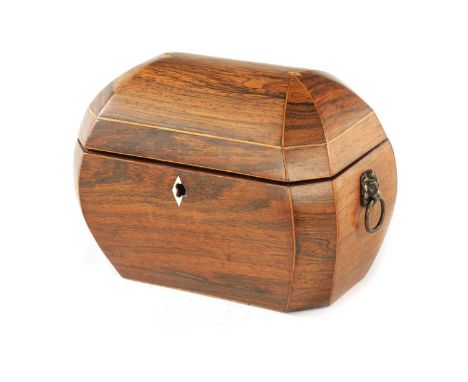 A REGENCY ROSEWOOD AND BOXWOOD INLAID BOMBE SHAPED TEA CADDY with hinged top revealing a lidded interior; with lions head sid