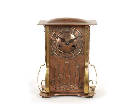 AN ARTS AND CRAFT COPPER AND BRASS MANTEL CLOCK the planished case with domed top and relief Arabic numerals fronting a Germa