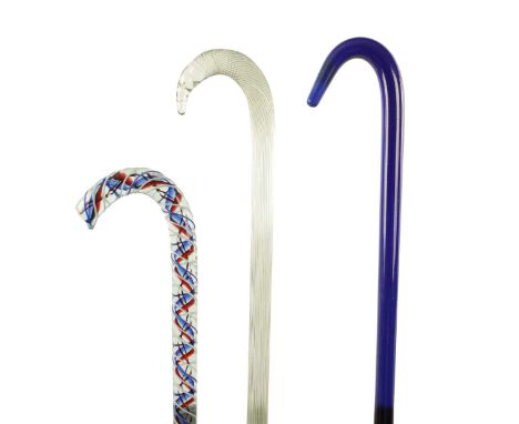 THREE LATE 19TH CENTURY FRIGGER WALKING STICKS comprising of a blue air twist, a Bristol blue and a jade green example.113cm 