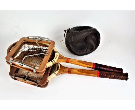 Two Dunlop Maxply wooden tennis rackets, together with an old leather football (3)