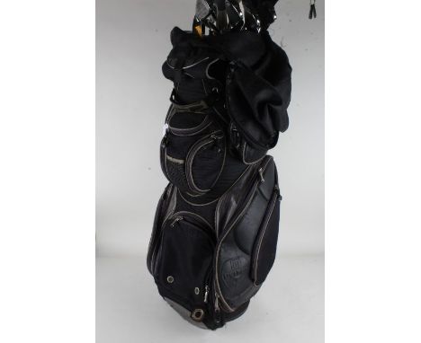 MacGregor golf clubs and others, with Dunlop woods and a driver, with golf bag