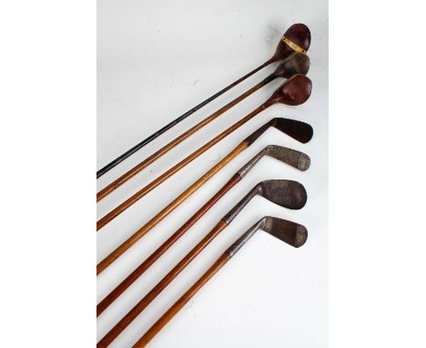 Vintage golf bag by M.E. Co. and clubs to include, Super Driver by Jack Smith, brassie by A.E. Luckett, a ladies mid-iron by 