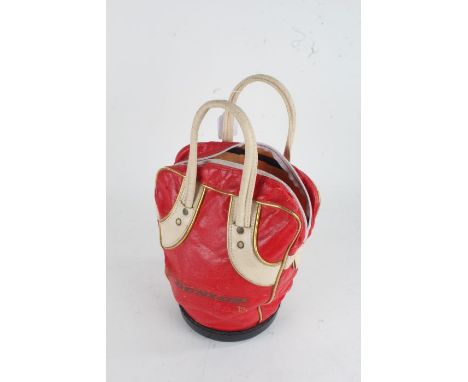 Dunlop red leather bag and contents of golf balls (qty)