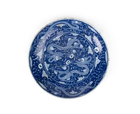  BLUE AND WHITE 'DRAGON' CHARGER QING DYNASTY, KANGXI MARK AND OF THE PERIOD 清康熙&nbsp;青花雙圈「大清康熙年製」六字楷書款 青花雙龍趕珠紋大盤potted with 