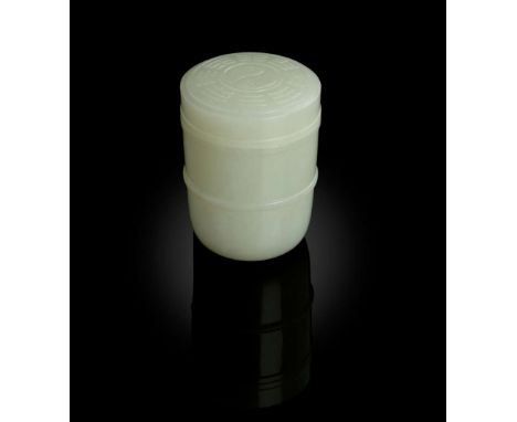  WHITE JADE 'TAIJI AND EIGHT TRIGRAMS' LIDDED BOX QING DYNASTY, 19TH CENTURY 清 白玉雕太極八卦圖筒形蓋盒in the form of a barrel, the sligh