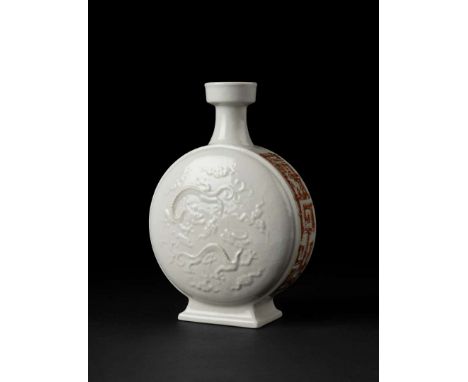  IRON-RED-DECORATED WHITE-GLAZED SOFT-PASTE MOONFLASK VASE YONGZHENG MARK AND POSSIBLY OF THE PERIOD 雍正款或到代 礬紅加彩白釉漿胎雙龍抱月瓶the 