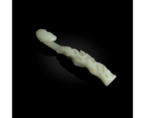  WHITE JADE 'LINGZHI' BELT HOOK QING DYNASTY, 18TH CENTURY 清 白玉雕如意靈芝帶鉤intricately carved with a large lingzhi fungus head for