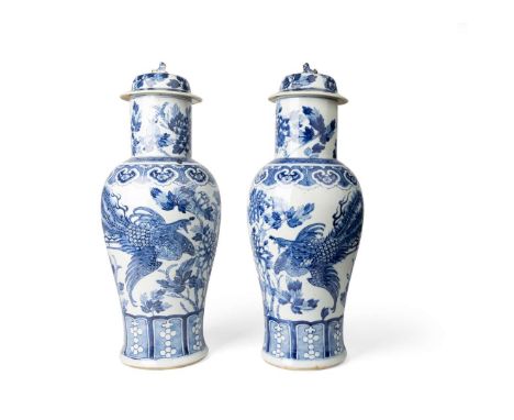  LARGE PAIR OF BLUE AND WHITE BALUSTER VASES WITH COVERS QING DYNASTY, 19TH CENTURY 清 青花鳳穿牡丹紋帶蓋對瓶 (共兩件)each painted with conf