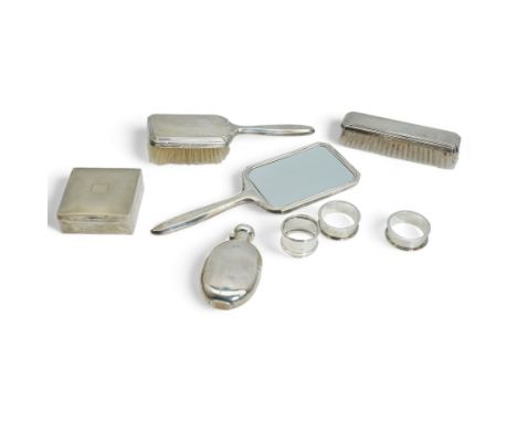 Silver oval spirit hip flask Sheffield 1899, engine turned silver square cigarette box, three piece silver backed dressing ta