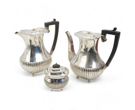 Silver three piece coffee set comprising coffee pot, hot water jug and sugar box each with half body fluted decoration, gadro