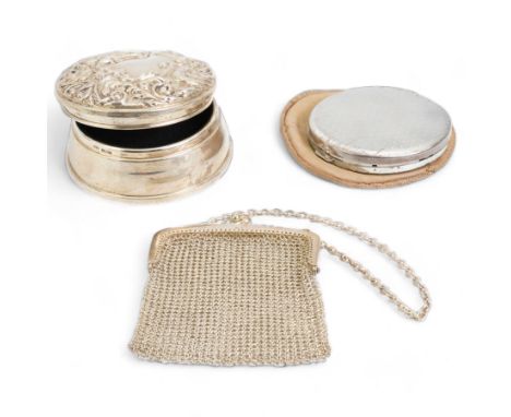Elizabeth II weighted silver circular trinket box with embossed hinge cover, Birmingham 1972, a silver compact and a silver m