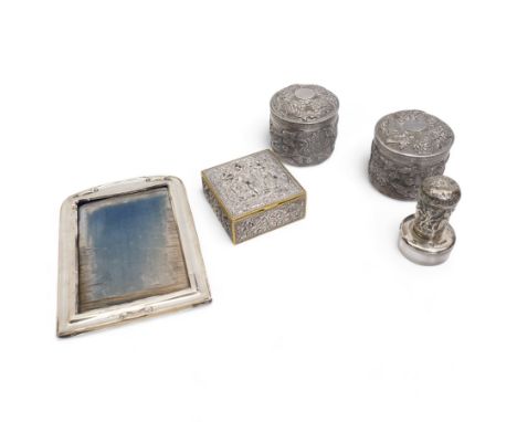 Pair of silver cylindrical dressing table boxes and covers embossed with trailing foliage H7cm, silver upright table photogra