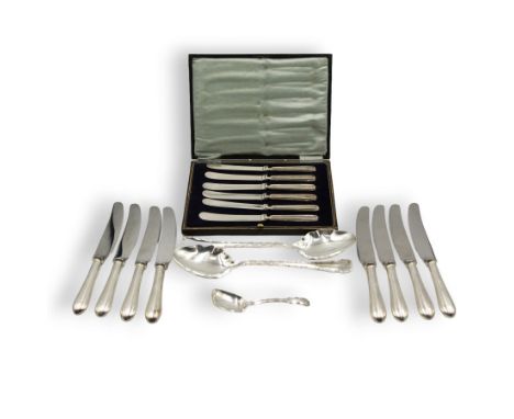 Set of eight silver handled dessert knives Sheffield 1977 Maker William Yates Ltd, pair of silver serving spoons Sheffield 19
