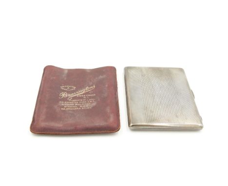 Engine turned silver cigarette case Birmingham 1937 Maker Bravingtons Ltd and in Bravingtons soft leather slip caseCondition 