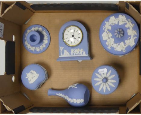 A Small Collection of Wedgwood Blue Jasperware includes mantle clock, vases, powder pot, candlestick etc.
