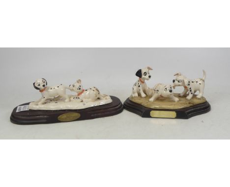 Two Royal Doulton 101 Boxed Dalmatians figures on wooden plinths to include 'Patch, Rolly and Freckles' and 'Lucy and Freckle
