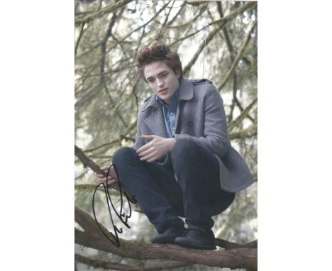 Movies Robert Pattinson 12x8 signed colour photo. He started his film career by playing Cedric Diggory in Harry Potter and th