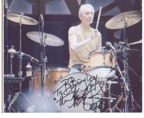 Rolling Stones - Charlie Watts signed 10 8 photo playing drums.  Good Condition. All signed pieces come with a Certificate of