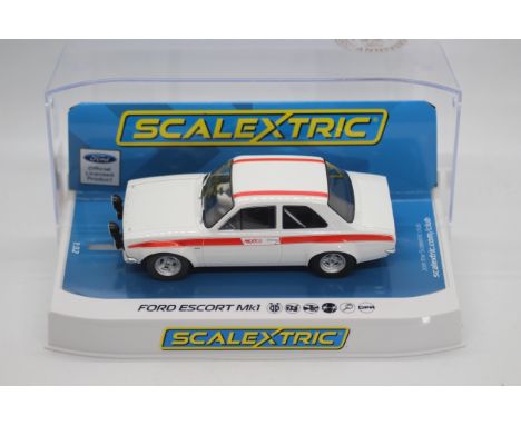 Scalextric - A boxed Scalextric C3934 Ford Escort MK.1 Mexico (Diamond White) '50th Anniversary Ford Escort' 1:32 scale slot 