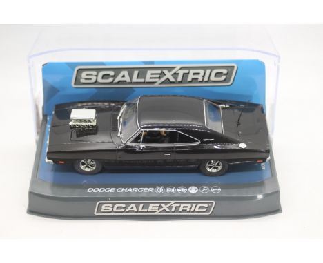 Scalextric - A boxed Scalextric C3936 Dodge Charger 1:32 scale slot car. Model appears to be in Mint condition in Mint perspe