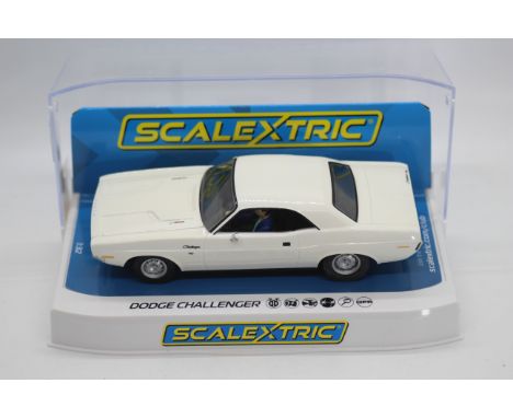 Scalextric - A boxed Scalextric C3935 Dodge Challenger 1:32 scale slot car. Model appears to be in Mint condition in Mint per