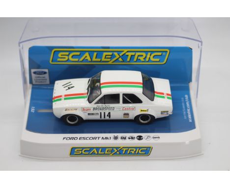 Scalextric - A boxed Scalextric C3924 Ford Escort MK.1 Brands Hatch 1971 'John Fitzpatrick' RN14 1:32 scale slot car. Model a