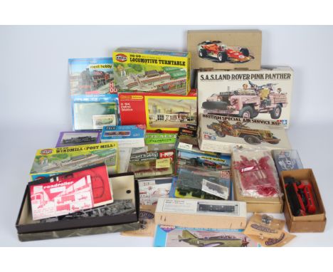 Airfix, Minichamps, Hoobytime, Merit, Others - A mixed collection of plastic model kits in various scales some part built, wi