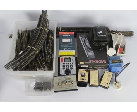 Hornby - Hammant &amp; Morgan - A quantity of loose OO gauge track, several power controllers including a modern DCC Controll