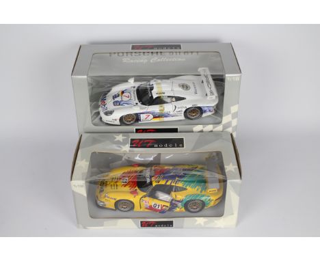 UT Models - 2 x boxed 1:18 scale Porsche 911 GT1 models # 966600, # 39721. Both models appear Mint in Good boxes with light s