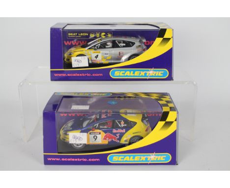 Scalextric - Two boxed Scalextric Seat Leon BTCC 1:32 scale slot cars. Lot includes C2705 'Jason Plato RN4'; together with C2