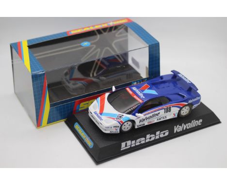 Scalextric - A boxed Lamborghini Diablo in Valvoline racing livery with working lights # C2192. The car appears Mint in a Ver