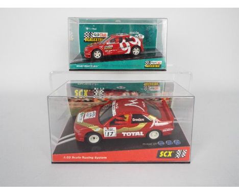 SCX - Scalextric - 2 x boxed cars, a Renault Megane Club 99 edition, a Peugeot 406 Total race car # 60100. Both models appear