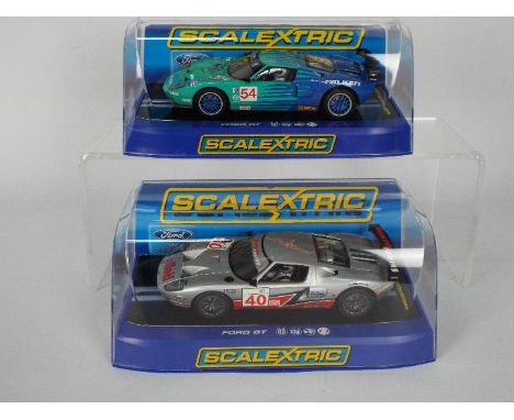 Scalextric - Two boxed Scalextric Ford GT-R 1:32 scale slot cars. Lot comprises Scalextric C3088 'Robertson Racing' RN40; wit