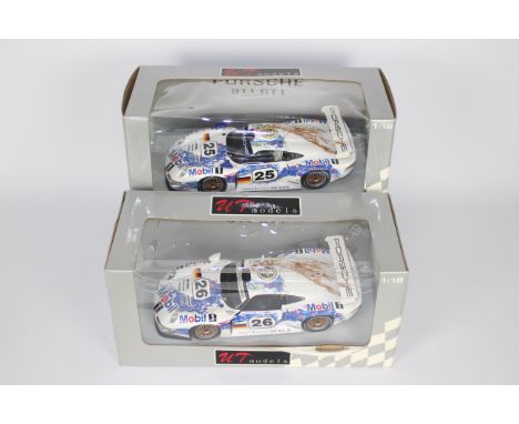 UT Models - 2 x Boxed 1:18 scale Porsche 911 GT1 cars number 25 &amp; 26 # 39723, # 39724. Both cars appear Mint in Fair boxe