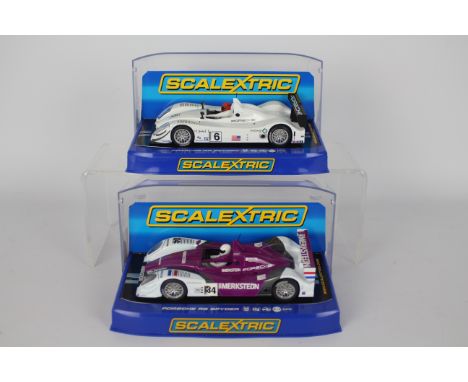 Scalextric - Two boxed Scalextric Porsche RS Spyder 1:32 scale slot cars. Lot consists of C2906 'Porsche Engineering' RN6; to