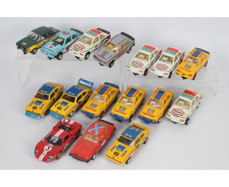 Scalextric - 16 x unboxed vintage Ford slot cars including ten Escort XR3i models, a MkI Escort, a GT40 and four Capri models