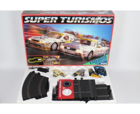 Scalextric - A boxed # C1004 Super Turismo set with Audi A4 and Opel Vectra Touring cars. The set shows signs of age and use 