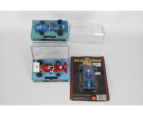 Scalextric - 3 x boxed / carded race car models, a March Ford 721 # C026, an Elf Tyrell # C121 and a Sieger Formula 3 # C353.